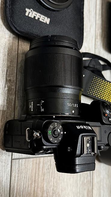 lens nikon: Nikon Z6 (Son nəsil güzgüsüz kamera) Daxilində olanlar: 	•	Nikkor Z — 3