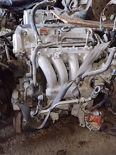 Двигатель Honda, бензиновый рядный 4‑цилиндровый SOHC с впрыском