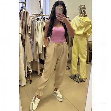 Pantalone: ✅Ženske široke pantalone sa karnerima na nogavicama i kaišem
✅2400 din — 1