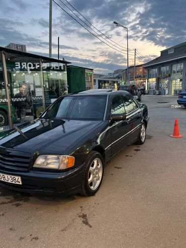 Mercedes-Benz: Mercedes-Benz C-Sinfi (W202) sedan - Kuzov: sedan, qara rəng — 5