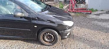 voma vozilo prodaja: DESNO KRILO CRNO XS ZA PEUGEOT 206 | imam sve delove za peugeot 206 — 1