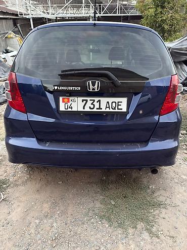 byd e2 2025: Honda Fit: 2010 г., Бензин, Хэтчбэк — 2