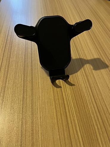zaslonka nedir: Avtomobil üçün hava çıxışına taxılan telefon tutacağı. Stokda cəmi — 1