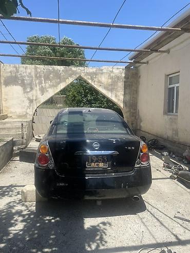 matoru vurub: Nissan Altima: 2.5 l | 2005 il Sedan — 2