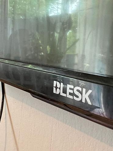 core 2: Телевизор BLESK, диагональ около 40–43". Тонкая рамка, плоская панель — 1