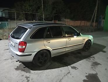 обмен демио: Mazda 323: 1999 г., Механика, Бензин, Универсал — 3
