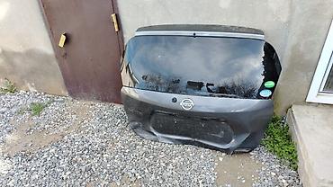 2104 baqaj: Arxa, Nissan NOTE, Yaponiya, Ünvandan götürmə — 2