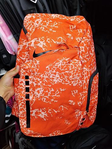 nike 44: Яркий городской рюкзак Nike, оранжевый с белым абстрактным принтом — 1