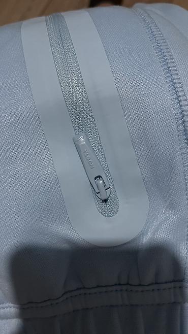 часы coros: Спортивные брюки Nike NOCTA - Цвет: светло‑голубой (ice blue) - — 4
