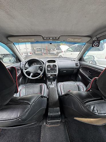харизма: Mitsubishi Carisma: 2003 г., Седан — 9