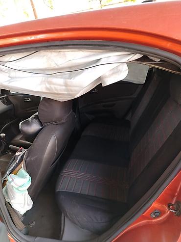 dizel generator qiymetleri: Kia Rio hatchback (CRDI, Sport paket yazıları ilə). Narıncı-qara iki — 6