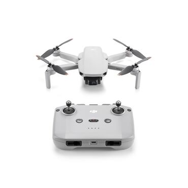 документ сканеры для проекторов сумки: Компактный квадрокоптер DJI в светло-сером корпусе, оснащённый камерой