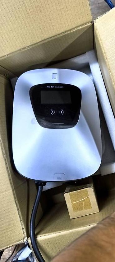 Зарядные устройства для электромобилей: Это легендарная и надёжная настенная зарядная станция AC EV Charger — 2