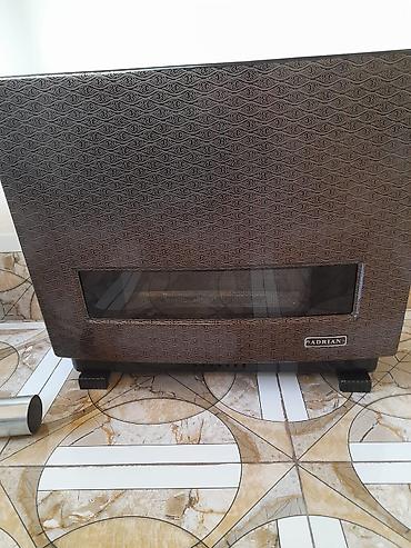 radiator: Adrian markalı qaz sobası (divara yaxın yerləşdirilən konvektor — 1