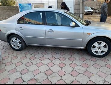 аренда авто последующим выкупом: Серебристый седан Ford Mondeo с механической коробкой передач