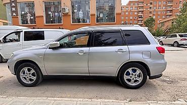 mitsubishi lancer evolution: Mitsubishi airtrek 2003 2 sadə mator ön çəkən Təkərlər təzə di — 2