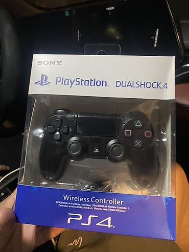 dualshock 4 купить: Беспроводной геймпад Sony PlayStation DualShock 4 (PS4), цвет черный — 1