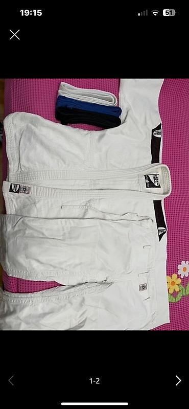 Kişi geyimləri: Məhsul: Braziliya Ciu-Citsu (BJJ) kimono dəsti Tərkib: - Ağ gi üstü — 1
