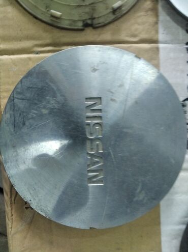 колпак ниссан: Продаю оригинальный колпачок от диска на Nissan,за 150 сом. Есть
