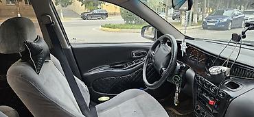 daewoo damas kredit: Daewoo Leganza: 2 l | 1998 il Sedan — 10
