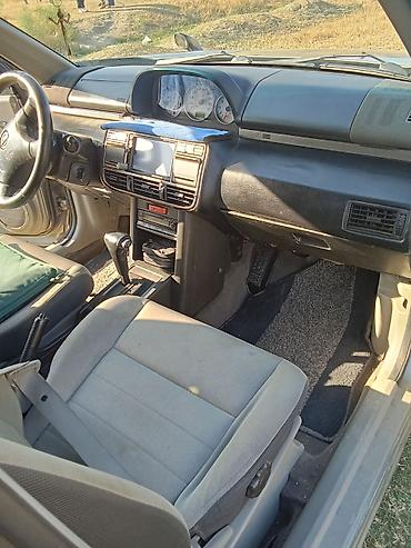 nissan note bufer: Nissan X-Trail (T30) – gümüşü rəngli, benzinlə çalışan kompakt SUV — 6