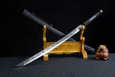 Коллекционные ножи: Катана Катана выполненная в японском стиле с красивой гравировкой на