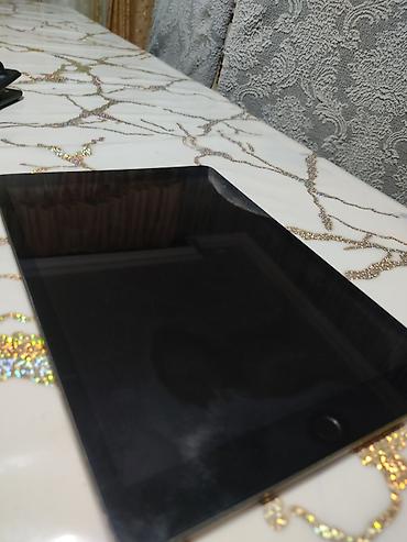 iped 9cu nesil: Apple iPad 5-ci nəsil (Model: MP2G2/MP2F2 seriyası; fotoda model — 1