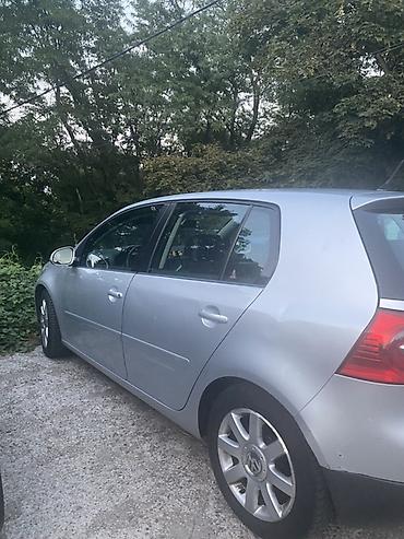 otkup vozila: Volkswagen Golf V, srebrna boja, 5 vrata (hečbek). Alu felne sa VW — 1