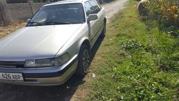 купить диски на внедорожник: Mazda 626: 1990 г., Механика, Седан