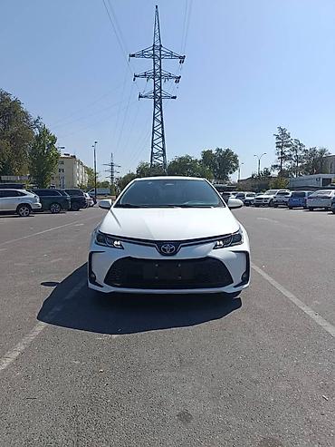 crown 2015: Toyota Corolla: 2021 г., 1.8 л, Вариатор, Гибрид, Седан — 4