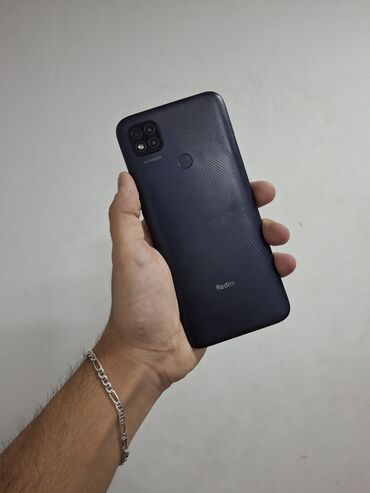 Xiaomi: Xiaomi Redmi 9C, 64 GB, rəng - Qara, 
 Zəmanət, Barmaq izi, İki sim kartlı