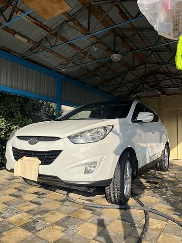 premier hazard siren: Hyundai ix35 – ağ rəngli, şəhər və uzun məsafələr üçün rahat — 2