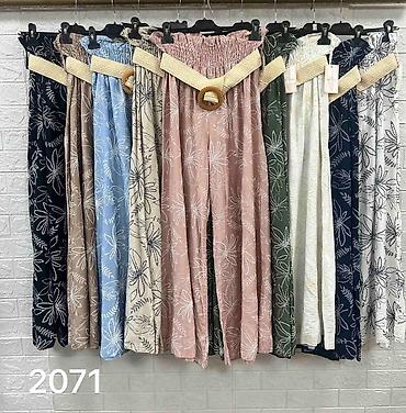 Kompleti: Komplet, haljina+pantalone
Cena 2900
Uni vel.
V23 — 10