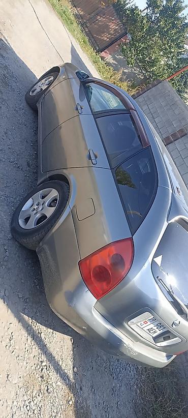 посадка авто: Nissan Primera: 2002 г., Универсал — 1