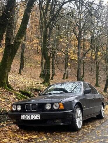 мерседес гигант 711: BMW 520: 2 л | 1990 г. Седан