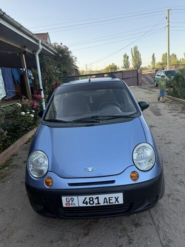 runx alex: Автомобиль Daewoo Matiz голубого цвета. Компактный хэтчбек оснащен