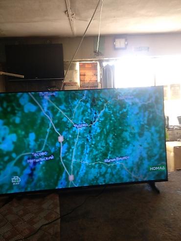 samsung a03: Телевизор LED, диагональ около 55–60". Тонкие рамки, устойчивые ножки — 4