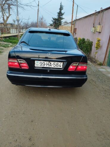Sirena Motors: Mercedes-Benz E‑Class (W210) sedan - Kuzov: qara rəng, 4 qapı