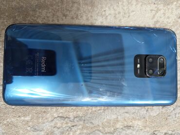 купить маленький микрофон: Смартфон Xiaomi Redmi в синем цвете, оснащенный квадрокамерой с