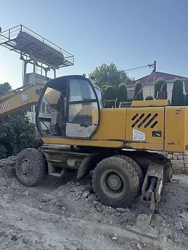 Ekskavatorlar: JCB təkərli ekskavator - Marka/model: JCB (təkərli ekskavator) - İş — 5