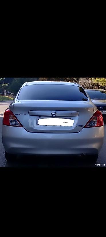 tesla model s: Nissan Sunny: 1.2 l | 2012 il Sedan — 2