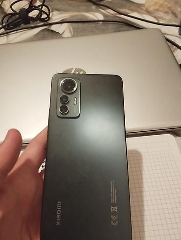xiaomi televizor: 📱 Xiaomi 12 Lite — SATILIR! 🔹 Yaddaş: 128 GB 🔹 Rəng: Qara 🔹 — 5