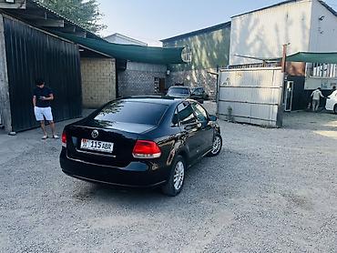 e 302: Volkswagen Polo: 2010 г., 1.6 л, Автомат, Бензин, Седан — 4