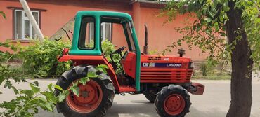 Тракторы: Kubota 35 ЛС 4WD
