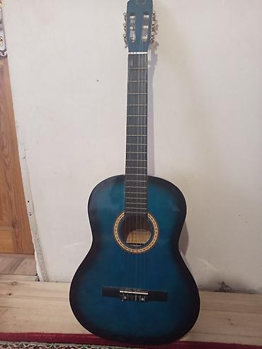 ikinci el gitara: Sadəcə simləri dəyişdirilməlidir — 1