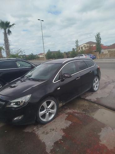 baqaji: Opel Astra: 1.4 l | 2011 il 310000 km Universal — 2