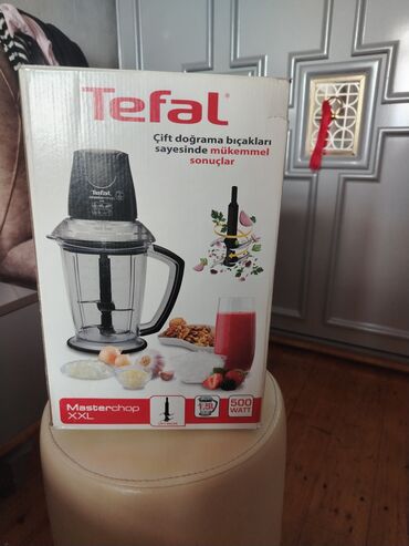 mikserlərin qiyməti: Salam metbexde xanımların elinde tutan tefal elektron cift dograma