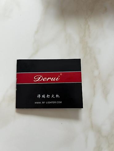 Digər aksesuarlar: Derui butan qazlı premium alışqan - Brend: Derui (www.rf-lighter.com — 4