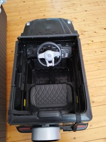 Manejlər: Uşaq üçün elektrikli minik maşını - Korpus: qara rəng, SUV/G-class