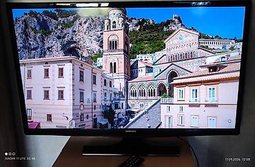 Телевизоры: Samsung LED televizor, təxmini 40–43 düym diaqonal (16:9). Standı və — 2
